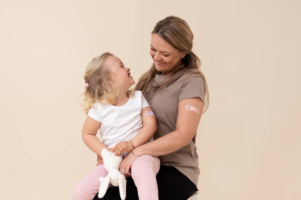 Mother and daughter getting immunizations at Maxwell Pharmacy in Frankston TX